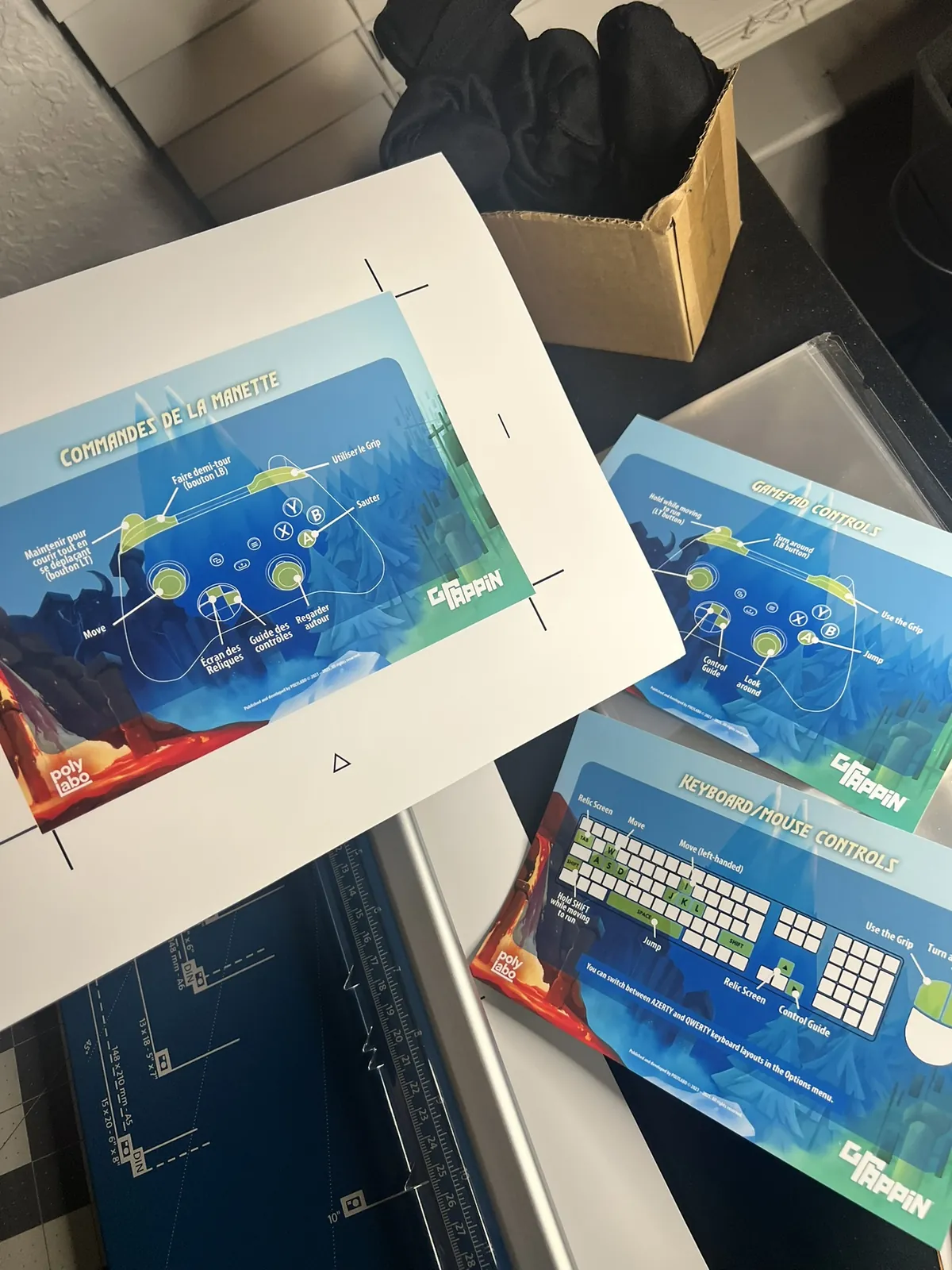 Freshly printed GRAPPIN controls inserts in French and English, laid out beside the trimmer.