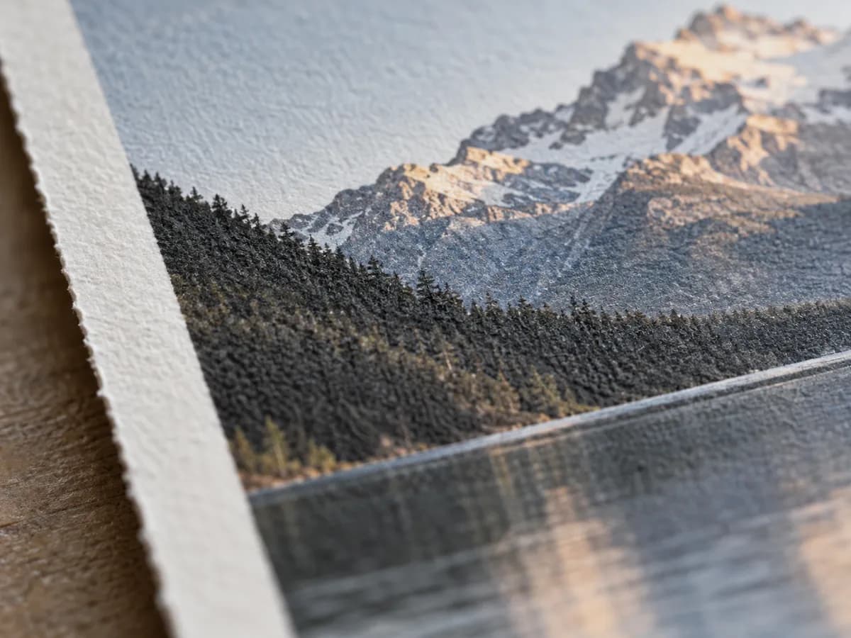 The edge of a mountain print on matte paper.
